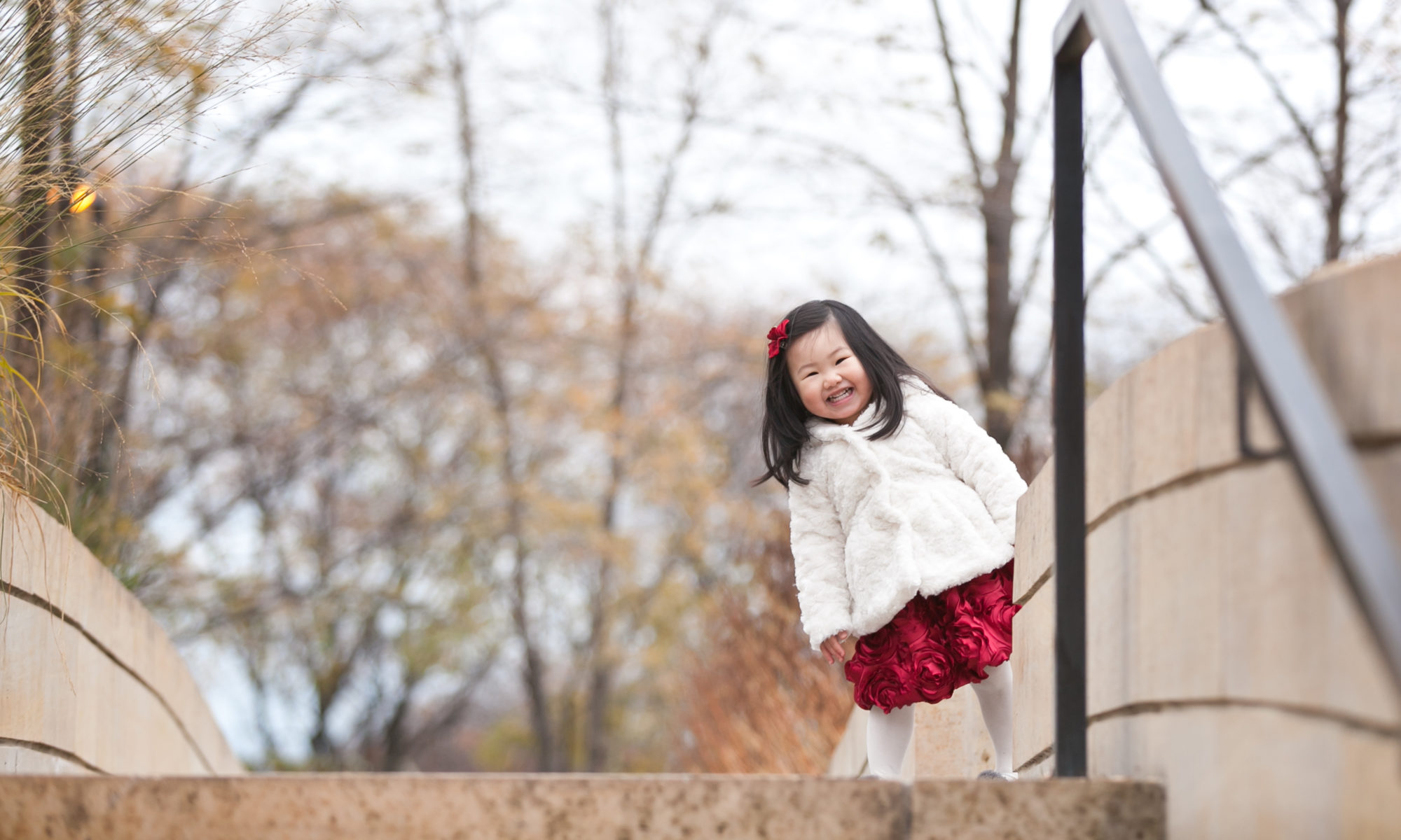 girl young smile red dress Lurie Gardens Chicago Millennium Park